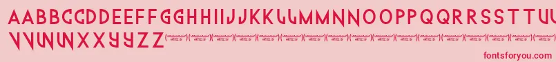 Technowanker Font – Red Fonts on Pink Background
