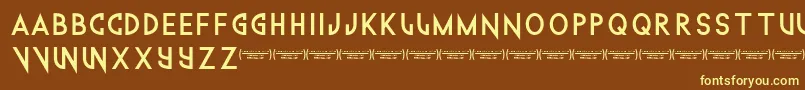Technowanker-fontti – keltaiset fontit ruskealla taustalla
