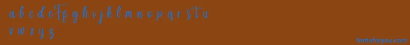 Forefarmersdemo-Schriftart – Blaue Schriften auf braunem Hintergrund