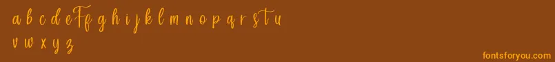 Forefarmersdemo Font – Orange Fonts on Brown Background