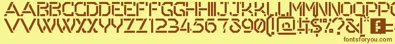 フォントOdessa – 茶色の文字が黄色の背景にあります。