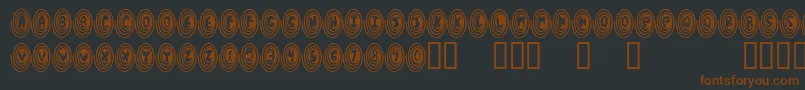 Spiralodellic-fontti – ruskeat fontit mustalla taustalla