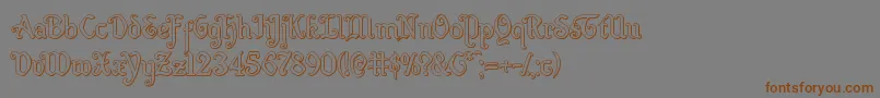 Quillswordout-Schriftart – Braune Schriften auf grauem Hintergrund