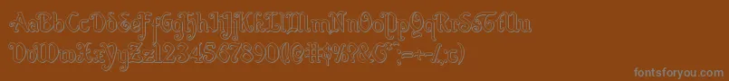 Quillswordoutフォントについての詳細 フォントQuillswordout – 茶色の背景に灰色の文字