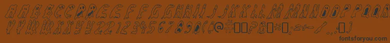 GroovyghostiesRegular Font – Black Fonts on Brown Background