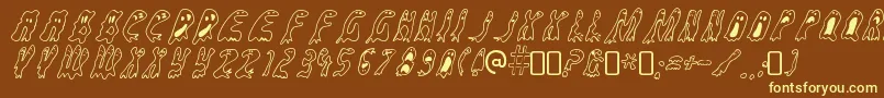 GroovyghostiesRegular-fontti – keltaiset fontit ruskealla taustalla