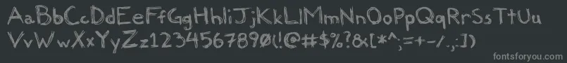 Felicia-fontti – harmaat kirjasimet mustalla taustalla