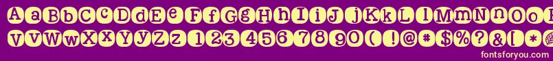 Kgwakemeup-Schriftart – Gelbe Schriften auf violettem Hintergrund