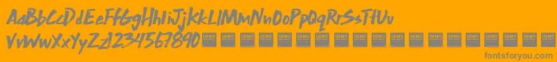 ExtraMileDemo-Schriftart – Graue Schriften auf orangefarbenem Hintergrund