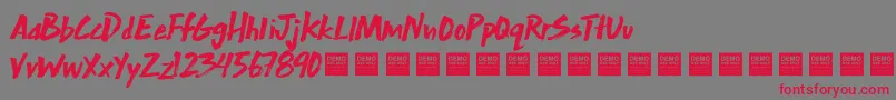 Weitere Informationen zur ExtraMileDemo-Schriftart ExtraMileDemo-Schriftart – Rote Schriften auf grauem Hintergrund