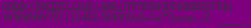 Dekthusian-fontti – mustat fontit violetilla taustalla