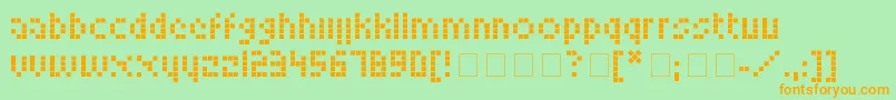 LookskyFont-fontti – oranssit fontit vihreällä taustalla