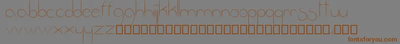 Fantastica-Schriftart – Braune Schriften auf grauem Hintergrund