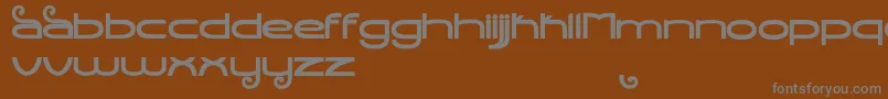 フォントStealthMagnumBold – 茶色の背景に灰色の文字