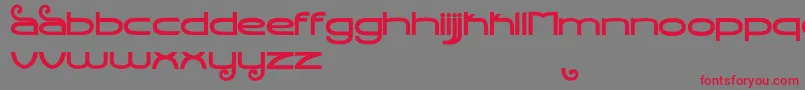 フォントStealthMagnumBold – 赤い文字の灰色の背景