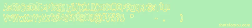 Mialgia Font – Yellow Fonts on Green Background
