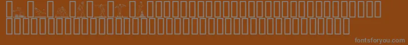 1998a-fontti – harmaat kirjasimet ruskealla taustalla