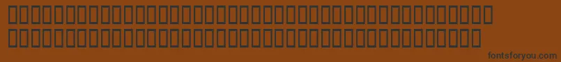 フォントWod3 – 黒い文字が茶色の背景にあります