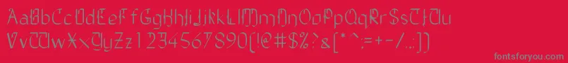 TheDailyBlah-fontti – harmaat kirjasimet punaisella taustalla