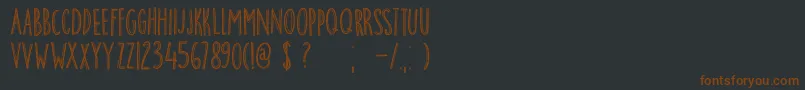 Шрифт DkBreakfastBurrito – коричневые шрифты на чёрном фоне