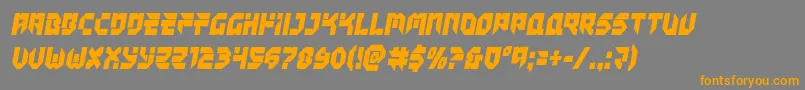 フォントTokyodriftercond – オレンジの文字は灰色の背景にあります。