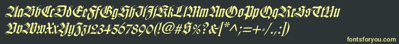 WilhelmklingsporgotischItalic-fontti – keltaiset fontit mustalla taustalla