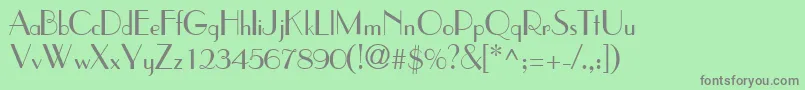 TouchesskRegular-fontti – harmaat kirjasimet vihreällä taustalla
