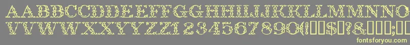 Trellisdisplaycapsssk Font – Yellow Fonts on Gray Background