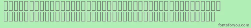 LinotypeAfrikaOne-fontti – harmaat kirjasimet vihreällä taustalla