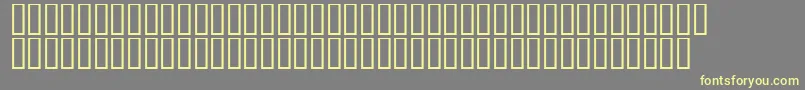 フォントLinotypeAfrikaOne – 黄色のフォント、灰色の背景