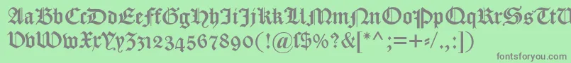 Dscaslongotischosf-Schriftart – Graue Schriften auf grünem Hintergrund