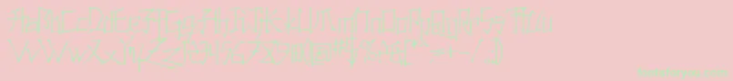 フォントKonfuct – ピンクの背景に緑の文字