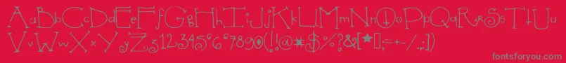 Shedevil-Schriftart – Graue Schriften auf rotem Hintergrund