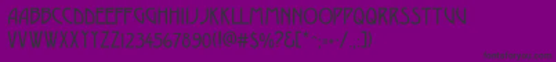 Desdac-fontti – mustat fontit violetilla taustalla