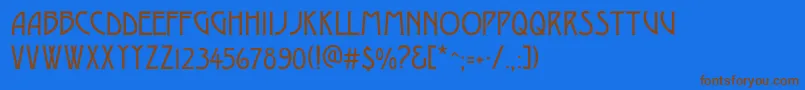 フォントDesdac – 茶色の文字が青い背景にあります。