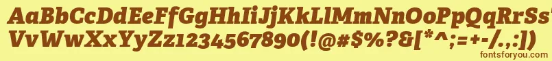 AdelleCyrillicHeavyItalic-fontti – ruskeat fontit keltaisella taustalla