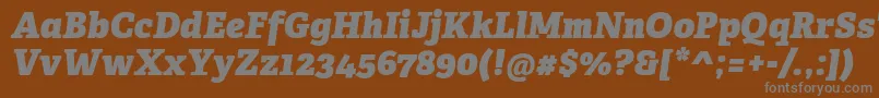 AdelleCyrillicHeavyItalic-fontti – harmaat kirjasimet ruskealla taustalla