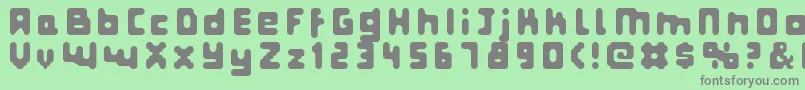 Fatpixel-fontti – harmaat kirjasimet vihreällä taustalla