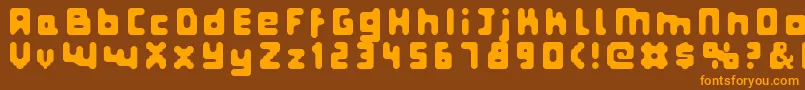 フォントFatpixel – オレンジ色の文字が茶色の背景にあります。
