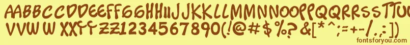 フォントTimoteo – 茶色の文字が黄色の背景にあります。