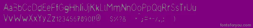 フォントMeagre – 紫の背景に灰色の文字