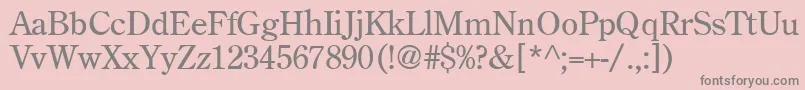 Oldstyleclassic-fontti – harmaat kirjasimet vaaleanpunaisella taustalla