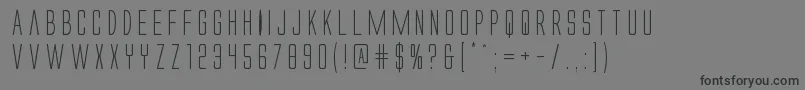 Alienleague Font – Black Fonts on Gray Background