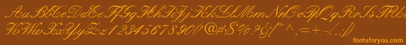 フォントQuillscriptssk – オレンジ色の文字が茶色の背景にあります。