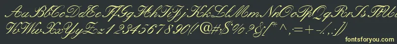 フォントQuillscriptssk – 黒い背景に黄色の文字