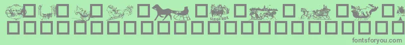 フォントSleigh – 緑の背景に灰色の文字