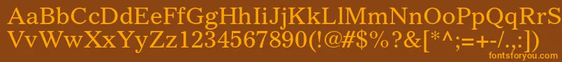 フォントGazetteltstdRoman – オレンジ色の文字が茶色の背景にあります。