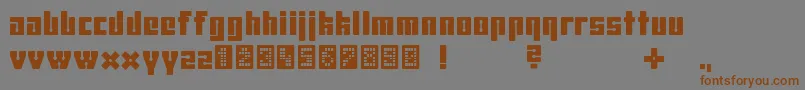 フォントUhura2239 – 茶色の文字が灰色の背景にあります。