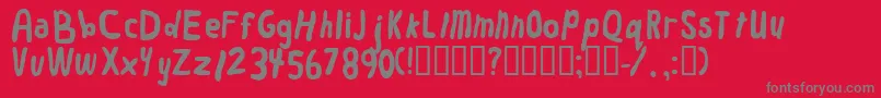フォントWorm – 赤い背景に灰色の文字