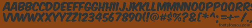 Шрифт Komikax – чёрные шрифты на коричневом фоне